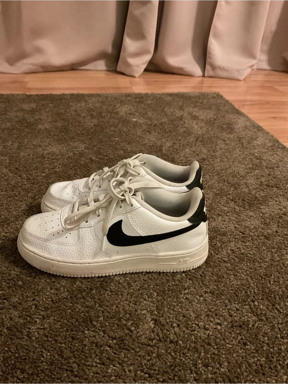 Nike Women’s White and Black Sneakers